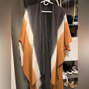 Blue, orange and white poncho sweater